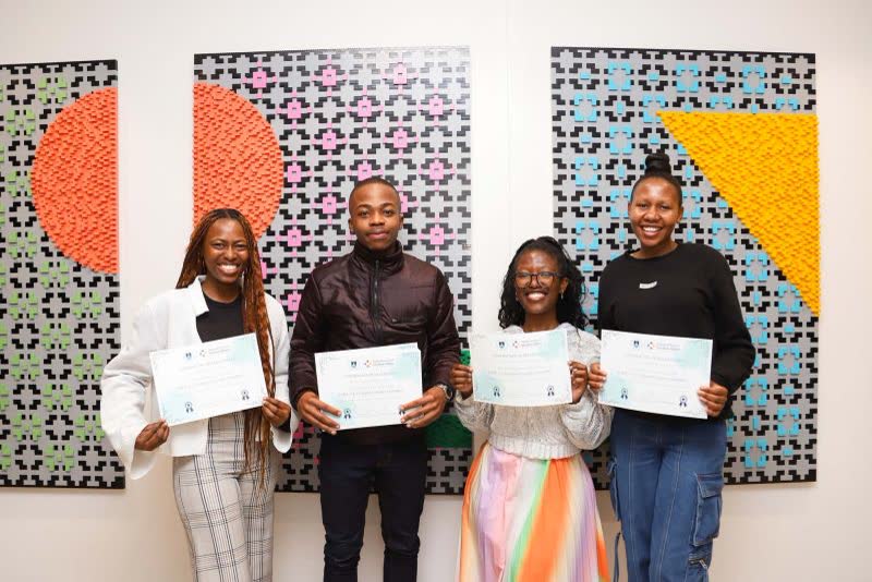 Candidates holding their registration certificates